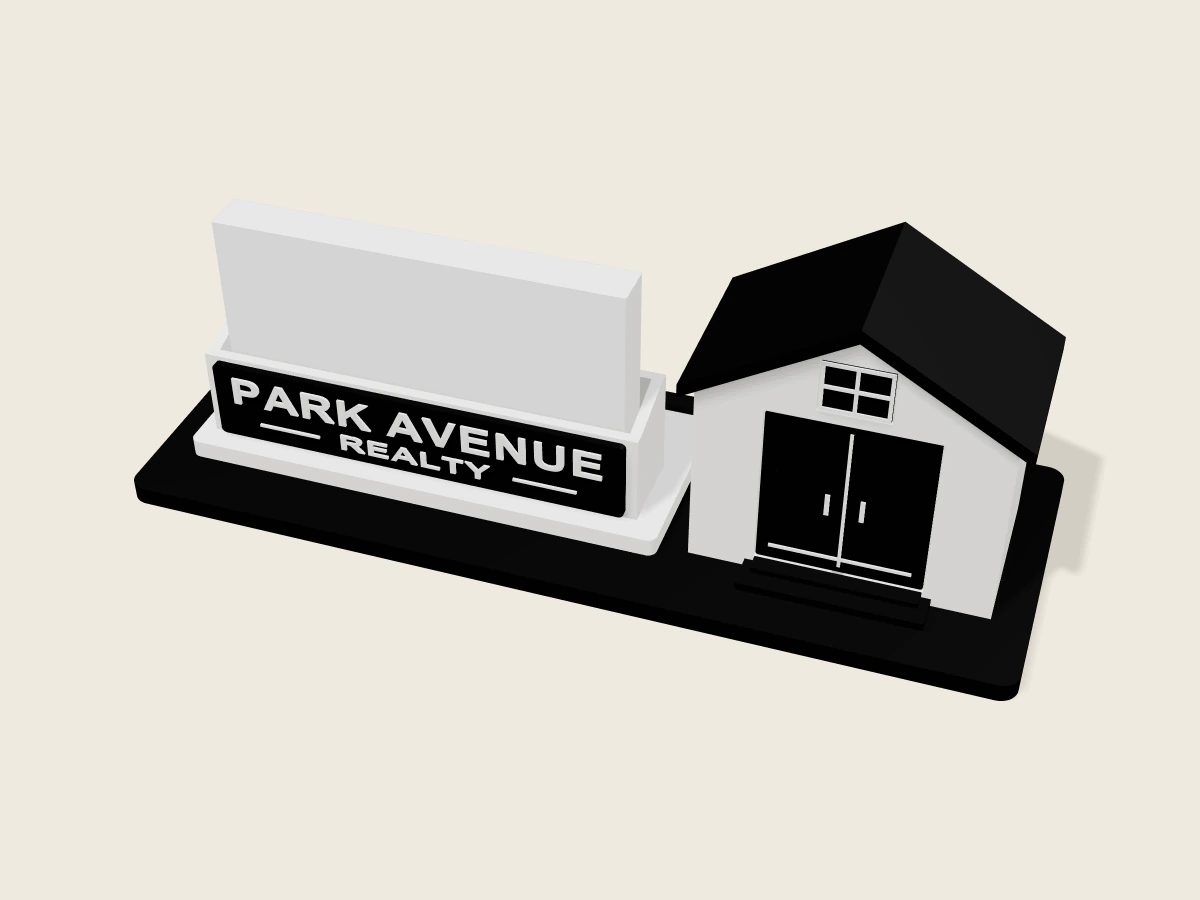Black and white Park Avenue Realty house-shaped card holder designed by Project HGM LLC